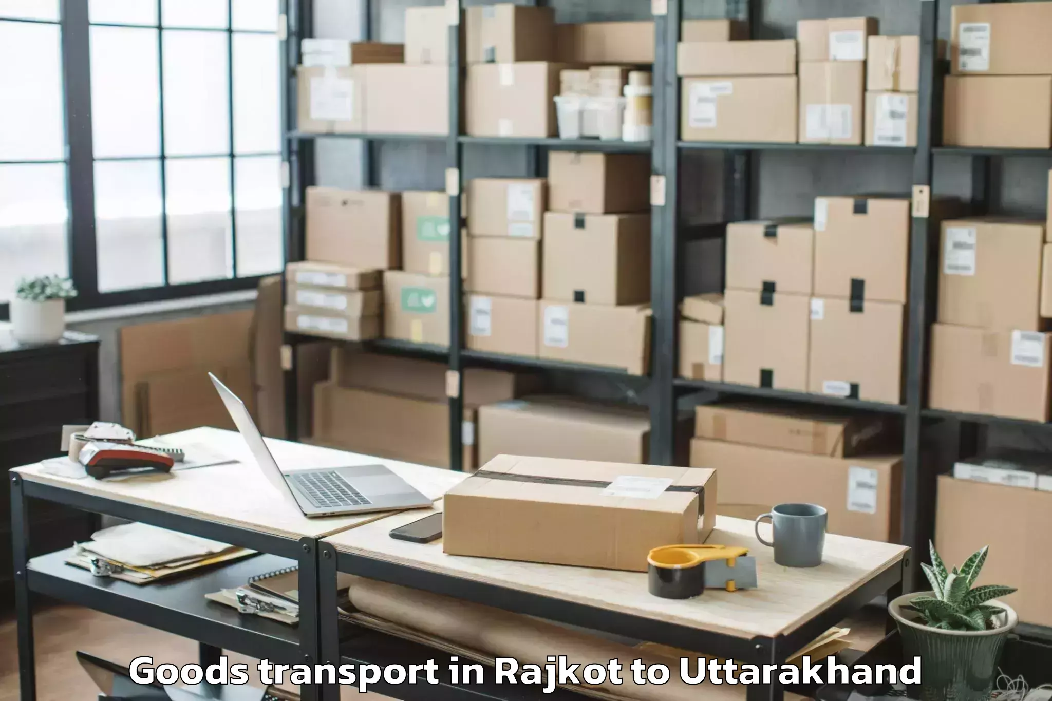 Book Rajkot to Graphic Era Hill University Cl Goods Transport Online